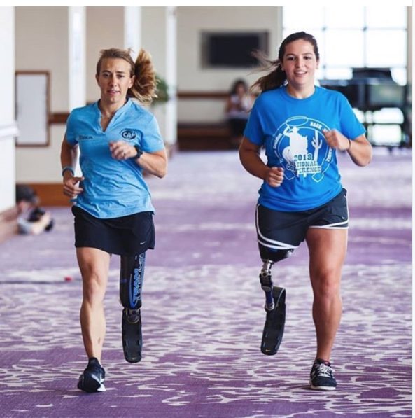 Sarah Reinertsen coaching Alexandra at the National Amputee Coalition conference